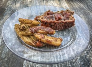 MEATLOAF WITH FRENCH FRIES AND TOMATO GRAVY